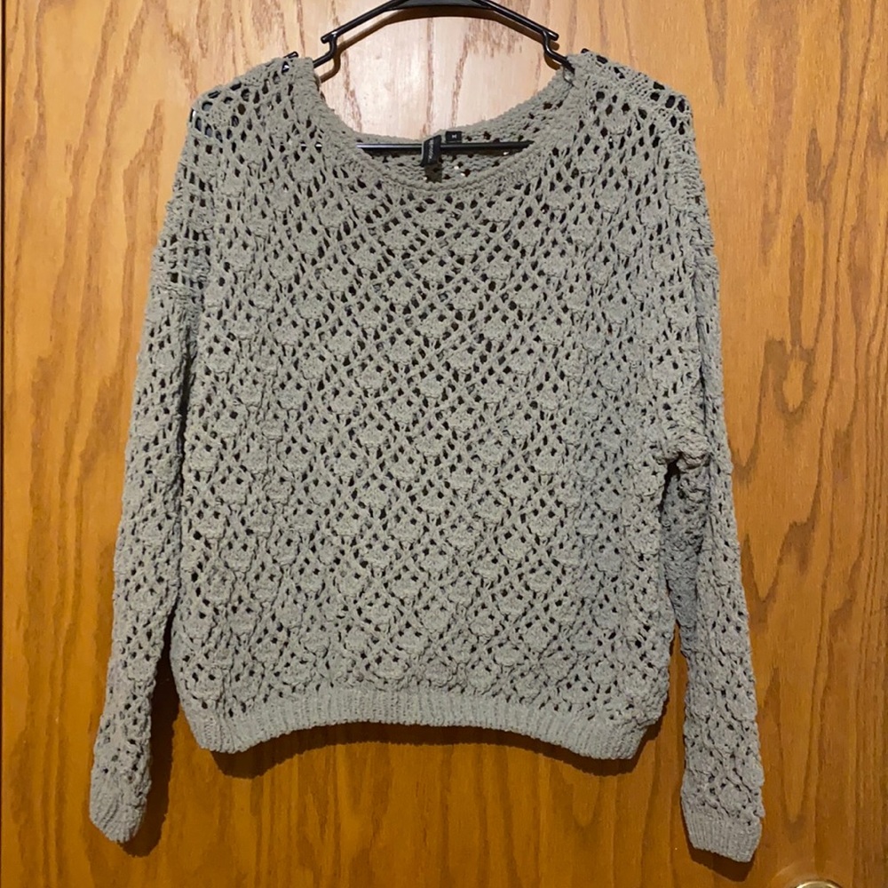 Sweater with holes